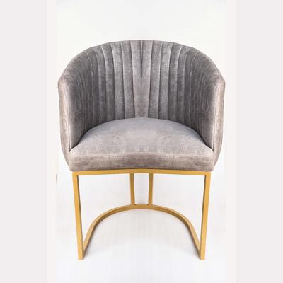 Velvet chair with gold metal frame