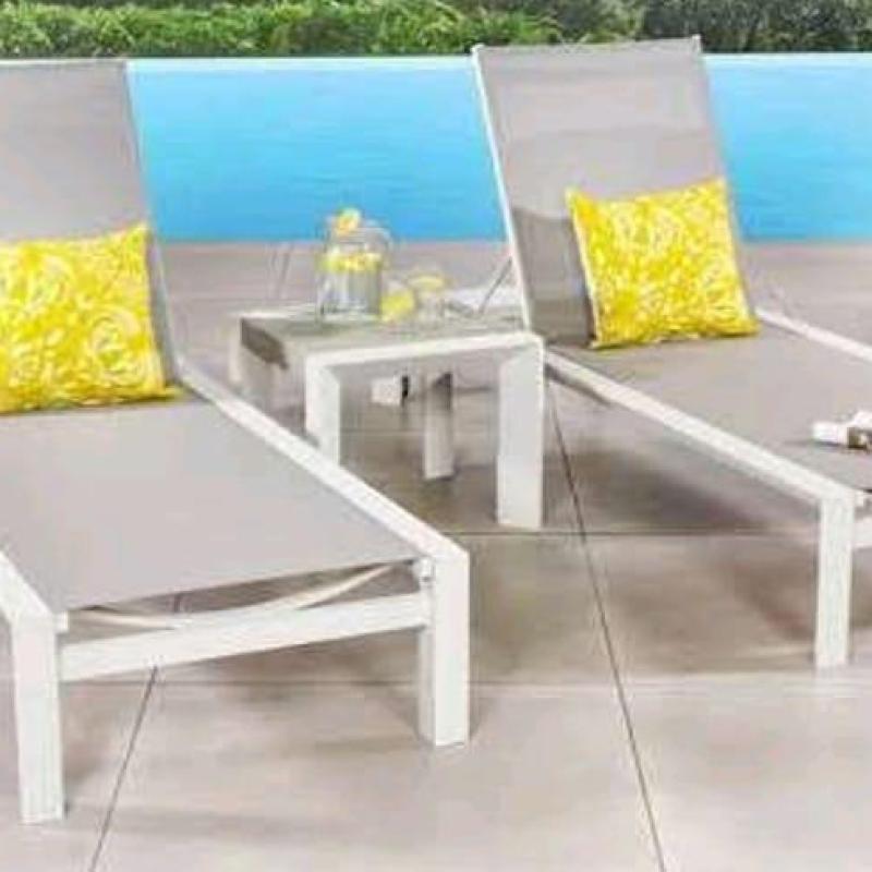 Double chaise lounge for relaxing by the pool